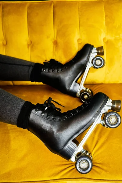 Crop Unrecognizable Female Roller Skates Lying Yellow Sofa While Staying — Stock Photo, Image