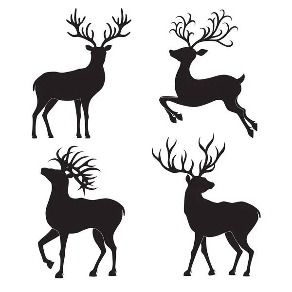 Ensemble de silhouettes de cerfs de Noël sur fond blanc . — Image vectorielle