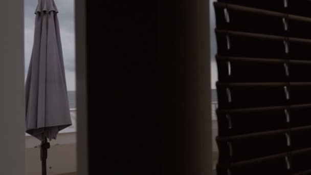 View from the window on the seascape. There are clouds in the sky, the weather is getting worse. Before the storm. — Stock Footage View from the window on the seascape. There are clouds in the sky, the weather is getting worse. Before the storm. Stock Video