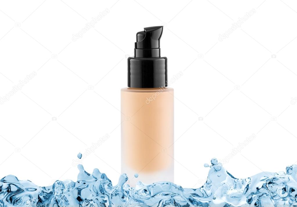 Foundation cosmetic glass tube with copy space in water splash, 