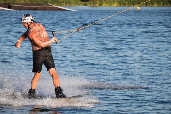 Rider wakeboarding in the cable wake park Merkur — Stock Photo, Image
