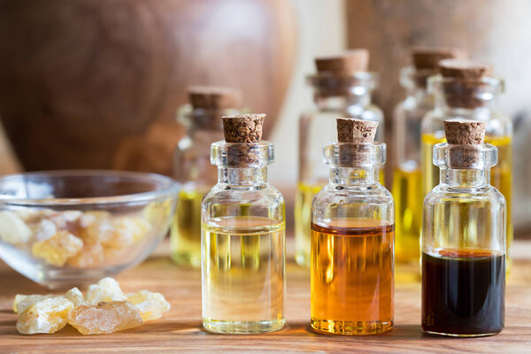 Bottles of essential oil with rankincense resin