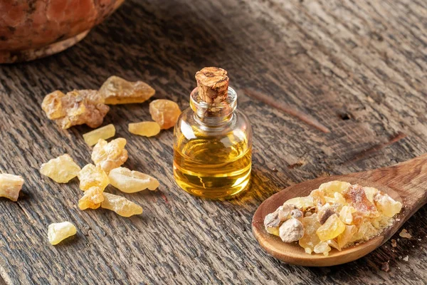 A bottle of frankincense essential oil and frankincense resin — 스톡 사진