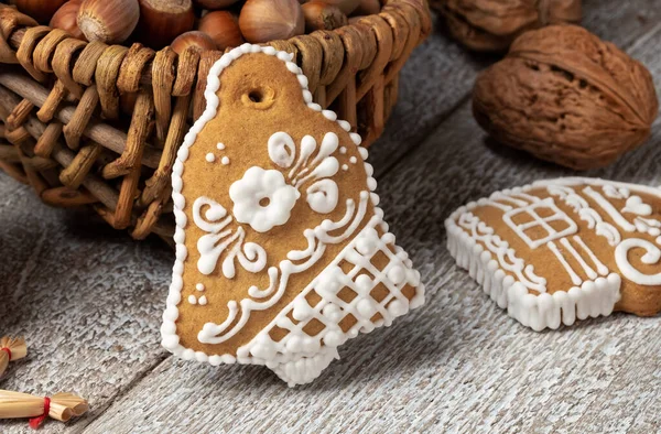Christmas Gingerbread Cookie Shape Bell Nuts Background — Stock Photo, Image
