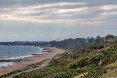 Christchurch, Dorset plajda görünümünü akşam