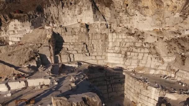 Aerial shot, the worlds famous Carrara marble caves with the soft sunset light — Stock Video