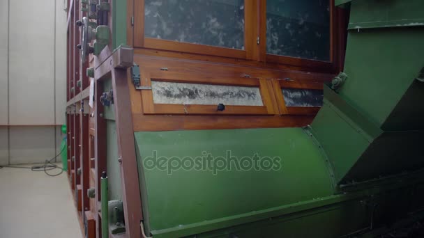 Huge wooden sorting machine from feather to down, selective focus — Stock Video