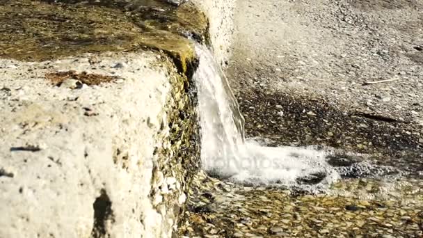 Slow motion of clear transparent fresh water flowing down from the rocks, HD — Stock Video