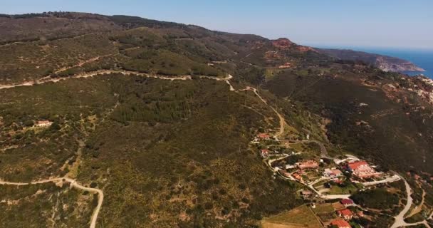 Aerial shot of a beautiful green Elba island in Tuscany, Italy, 4K — Stock Video