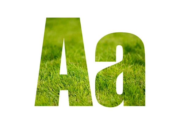 Dubbele blootstelling met groen gras. Brief A. geïsoleerd op witte achtergrond — Stockfoto