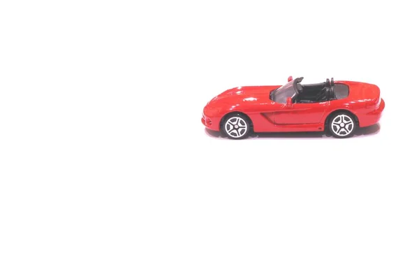 Coche de juguete rojo con una parte superior abierta Fotos de stock libres de derechos