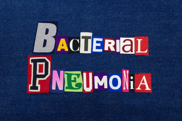BACTERIAL PNEUMONIA, coronavirus symptom, COVID-19, word text collage, worldwide pandemic flu virus, disease epidemic, typography colorful letters on blue denim, horizontal aspect