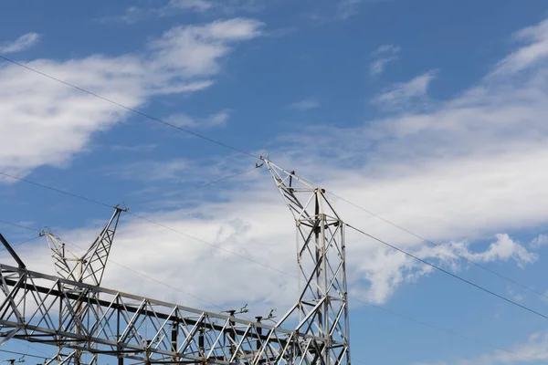 Electrical Power Lines Entering Power Transfer Station Gridded Trusses Blue — Stock Photo, Image