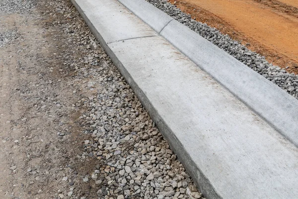 New Extruded Curb Edging Street Construction Gravel Road Bed Prepared — Stock Photo, Image