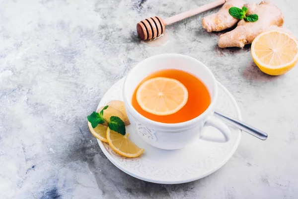 White cup of ginger tea — Stock Photo, Image