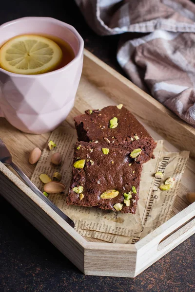 Tea Lemon Mint Leaves Served Biscuit Brownie Pistachios Wooden Tray — Stock Photo, Image