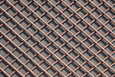 Kalın çubuklar kılavuz. Çubuklar demirsiz (nonferrous) metal yapılmış. Doku, 