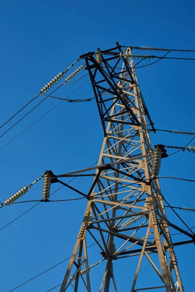 The support of the high-voltage transmission line against the bl Stock Image