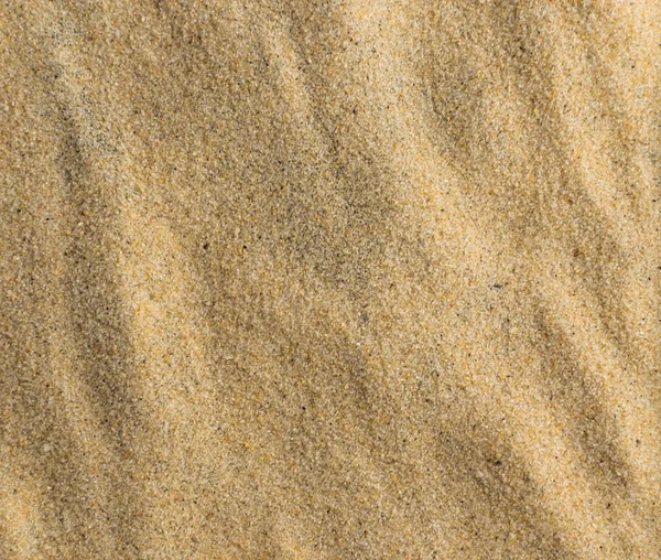 Geprägter Hintergrund aus reinem feinem Meersand — Stockfoto