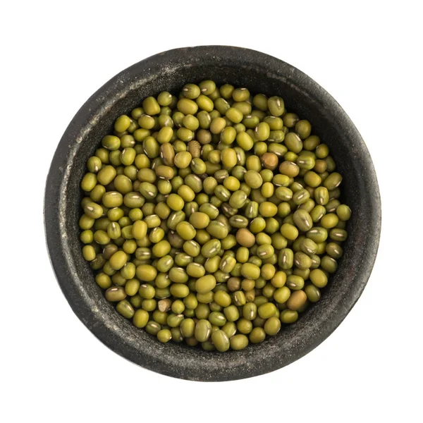 Raw suché fazole Mung zrna haldy v černé železné Bowl — Stock fotografie