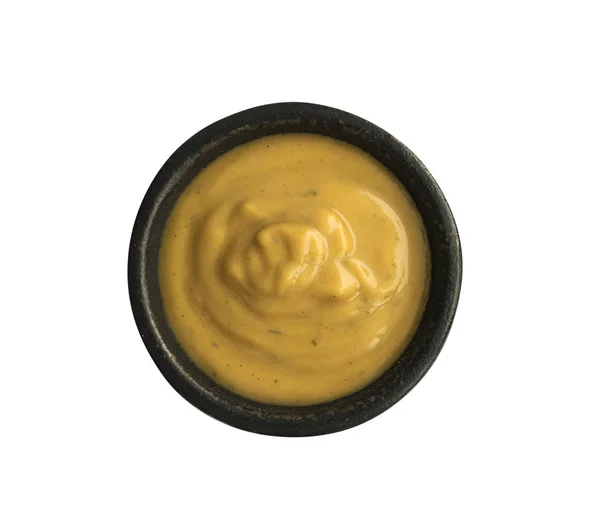 Mustard Sauce in Round Black Bowl Isolated on White Background — Stock Photo, Image