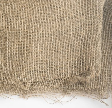 Çuval bezi kenar veya eski keten tuval üzerine beyaz arka plan