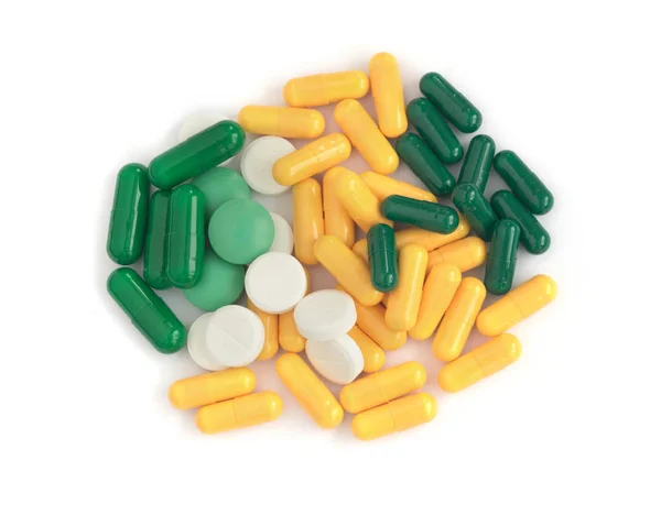 Píldoras de medicina farmacéutica en fondo blanco — Foto de Stock