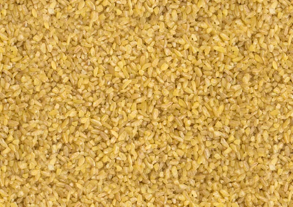 Dry Bulgur Wheat Background Closeup and Top View — Stock Photo, Image