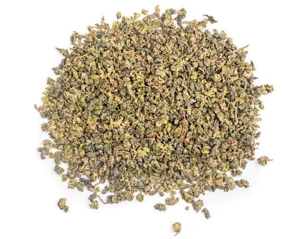 Droge groene thee bladeren op witte achtergrond — Stockfoto