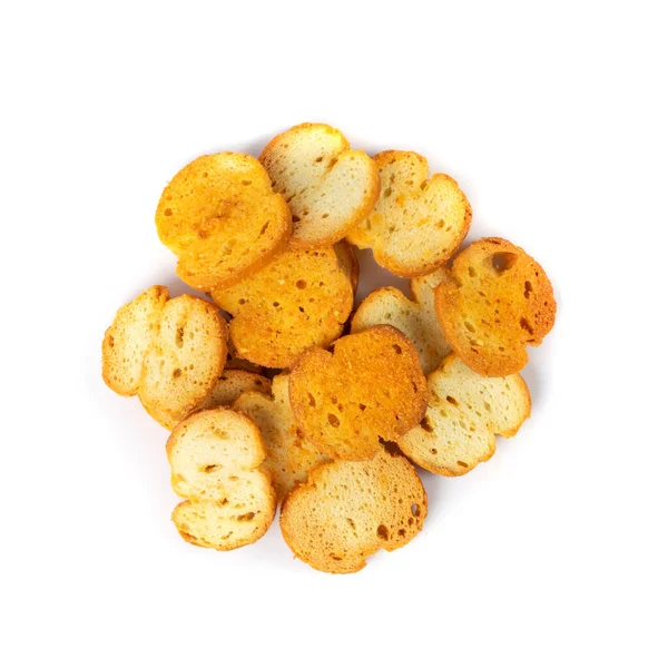 Homemade crunchy croutons with garlic, herbs and spices. Round spicy bruschetta crackers, seasoning rusks or small fried bread snacks for bear or salad — Stock Image Homemade Crunchy Croutons Garlic Herbs Spices Spicy Bruschetta Crackers Seasoning Stock Picture