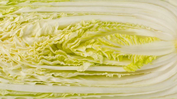 Half of Chopped Chinese Cabbage, Napa Cabbage or Wombok Texture Background. Fresh Green Sliced Cabbage Salat Pattern — Stock Image Half Chopped Chinese Cabbage Napa Cabbage Wombok Texture Background Fresh Royalty Free Stock Images