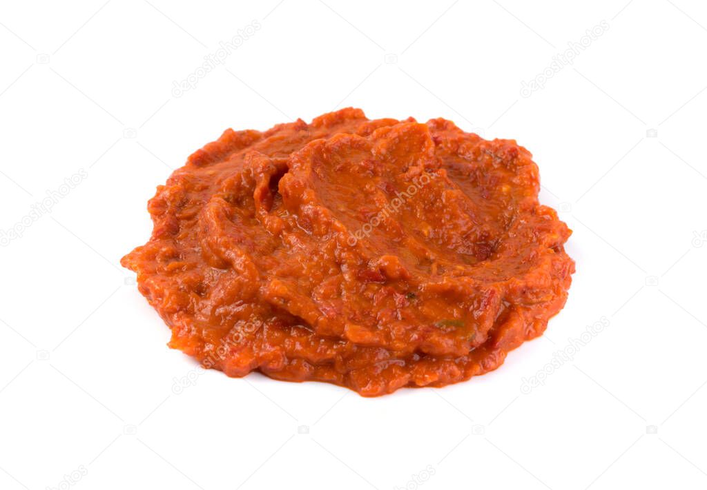 Ajvar or pindjur orange vegetable spread made from bell peppers, eggplants and oil. Marinara sauce, salsa, chutney or lutenica isolated close up