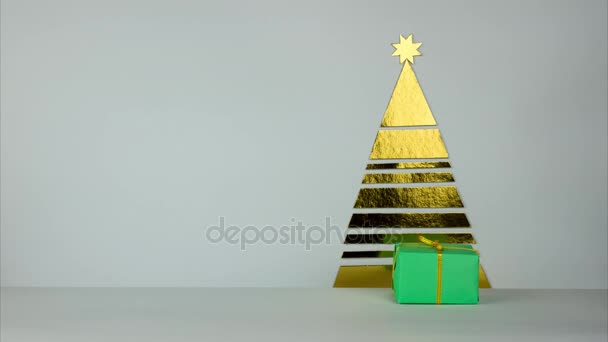 Gifts in green wraps move from different sides to the Christmas tree. Paper golden tree with gifts under it. Stop motion — Stock Video