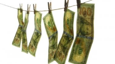Doları banknot bir ip clothespins ile dayan. Kirli para kavramı