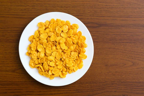 Corn flakes on plate — Stock Photo, Image