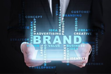 Marka kavramı sanal ekran üzerinde. İş kavramı. Kelime bulutu.