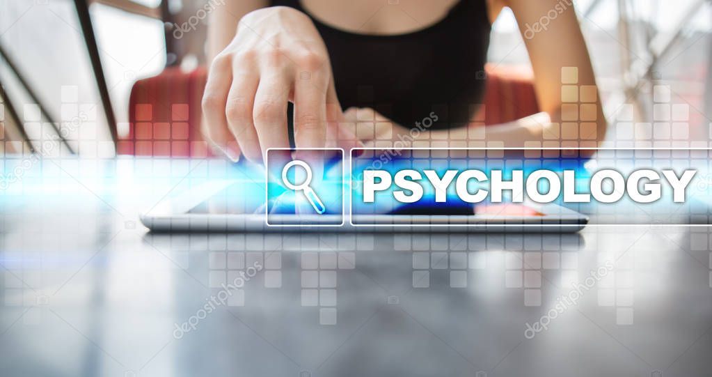 Woman using tablet pc and selecting psychology.
