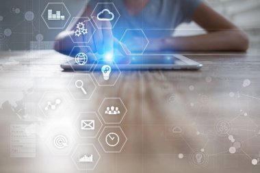 İş ve teknoloji kavramı. Grafikler ve sanal ekran simgeleri