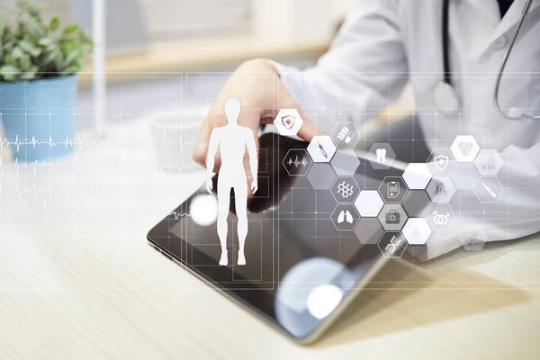 Doctor using modern computer with Medical record diagram on virtual screen concept. Health monitoring application. — Stock Photo, Image