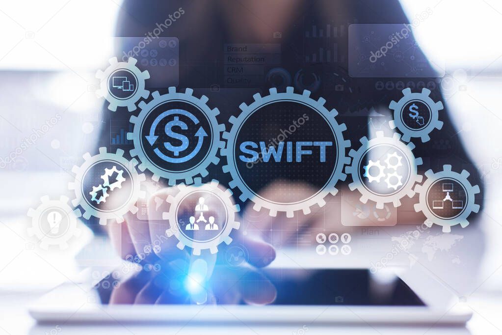 SWIFT international payment system financial technology banking and money transfer concept on virtual screen.