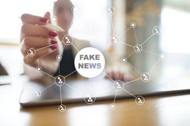 Sanal ekran üzerinde sahte haber uyarı.