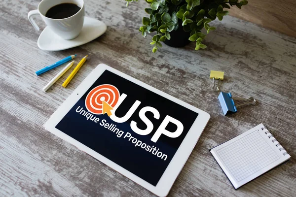 USP - Eşsiz satış teklifleri. Cihaz ekranında iş ve finans kavramı.