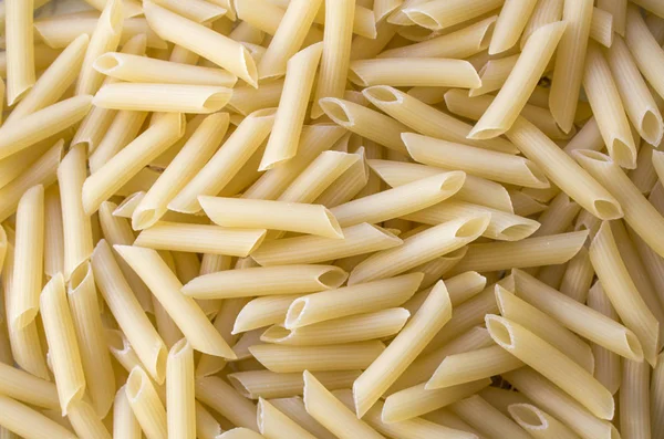 Dry pasta background — Stock Photo, Image