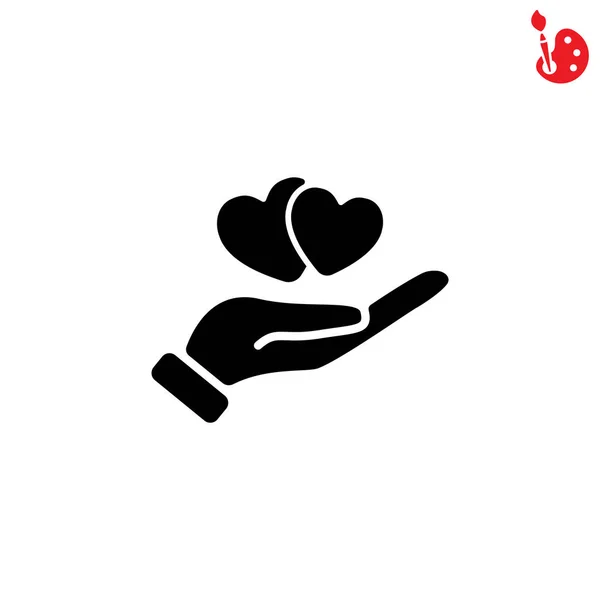 Hearts in hand icon — Stock Vector