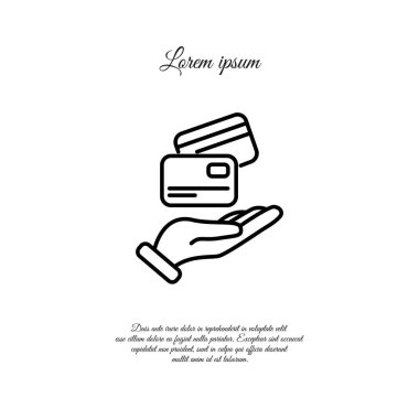 Kredi kartı elinde.