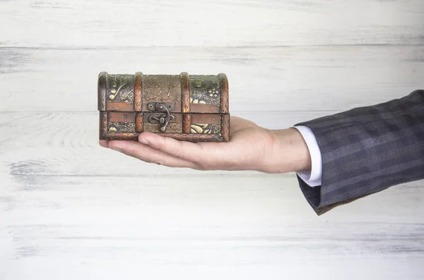 Antique chest in the hand — Stock Photo, Image