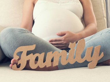 Pregnant Woman with family message. Maternity concept. Baby Shower clipart