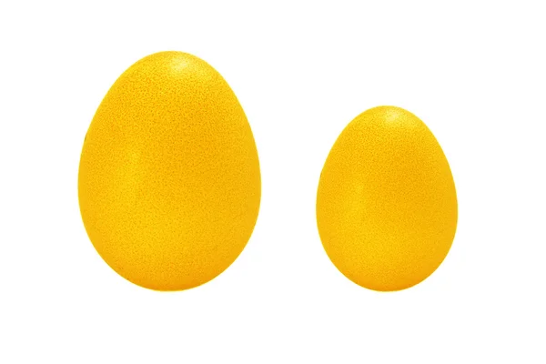 Яйця золоті на білому тлі — стокове фото