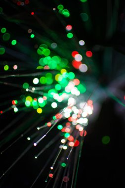 Renkli bokeh daire ışık gece kutlamak, hafif yeşil arka plan bulanıklık.