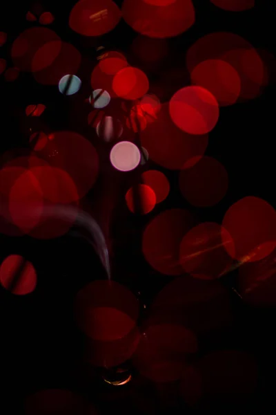 Красный боке свет празднуют ночью, разрядить свет абстрактный фон . — стоковое фото
